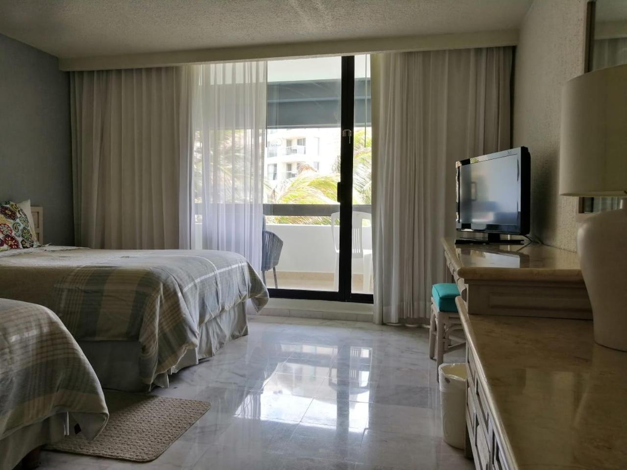 Beachfront Getaway Condo Cancún Zimmer foto